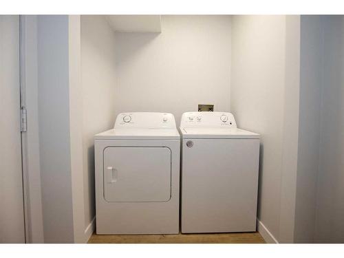 275 Hawkwood Boulevard Nw, Calgary, AB - Indoor Photo Showing Laundry Room