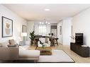 64 Creekside Drive, Calgary, AB  - Indoor Photo Showing Living Room 