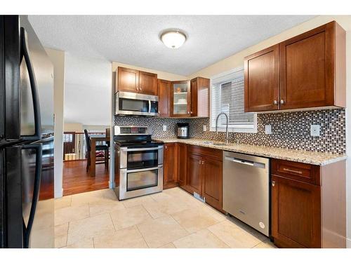 53 Shawinigan Road Sw, Calgary, AB - Indoor Photo Showing Kitchen