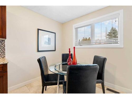 53 Shawinigan Road Sw, Calgary, AB - Indoor Photo Showing Dining Room