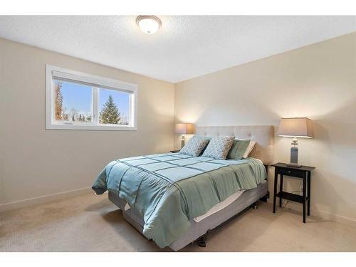 53 Shawinigan Road Sw, Calgary, AB - Indoor Photo Showing Bedroom