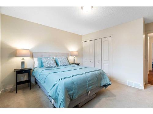 53 Shawinigan Road Sw, Calgary, AB - Indoor Photo Showing Bedroom