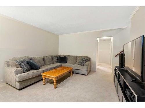 53 Shawinigan Road Sw, Calgary, AB - Indoor Photo Showing Living Room