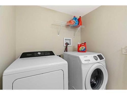 53 Shawinigan Road Sw, Calgary, AB - Indoor Photo Showing Laundry Room