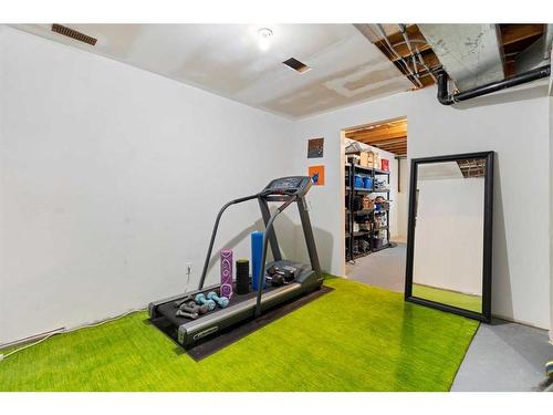 53 Shawinigan Road Sw, Calgary, AB - Indoor Photo Showing Gym Room