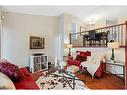 53 Shawinigan Road Sw, Calgary, AB  - Indoor Photo Showing Living Room 