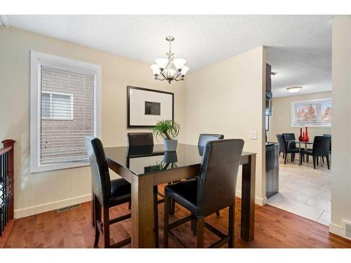 53 Shawinigan Road Sw, Calgary, AB - Indoor Photo Showing Dining Room