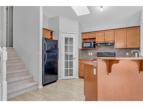 211 Cranberry Way Se, Calgary, AB - Indoor Photo Showing Kitchen