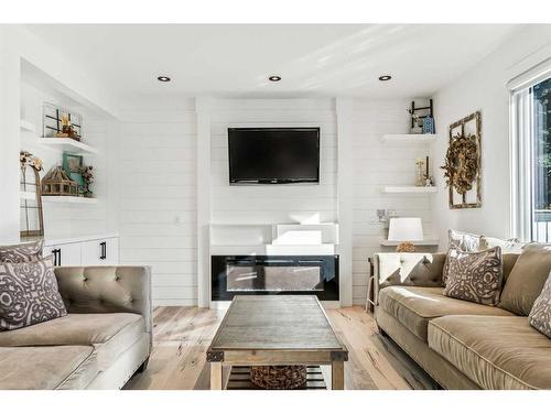 68 Hawkwood Drive Nw, Calgary, AB - Indoor Photo Showing Living Room With Fireplace