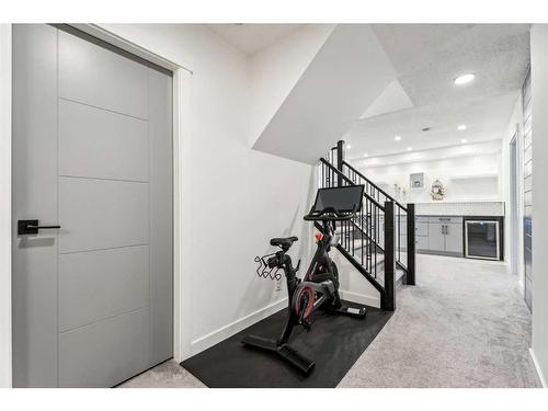 68 Hawkwood Drive Nw, Calgary, AB - Indoor Photo Showing Gym Room