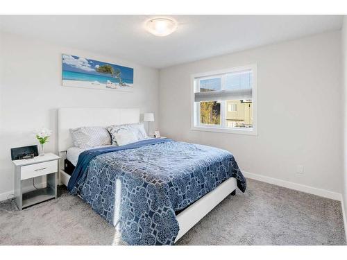 27 Bayview Circle Sw, Airdrie, AB - Indoor Photo Showing Bedroom