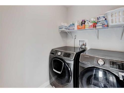 27 Bayview Circle Sw, Airdrie, AB - Indoor Photo Showing Laundry Room