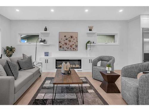 1172 Lake Sundance Crescent Se, Calgary, AB - Indoor Photo Showing Living Room With Fireplace