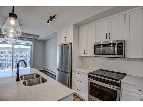 424-400 Auburn Meadows Common Se, Calgary, AB - Indoor Photo Showing Kitchen With Double Sink