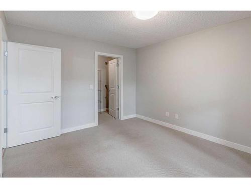 109-201 Sunset Drive, Cochrane, AB - Indoor Photo Showing Other Room