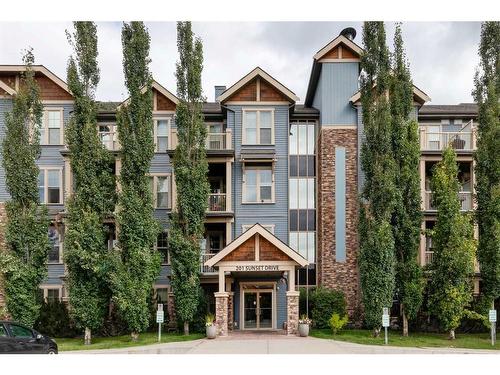 109-201 Sunset Drive, Cochrane, AB - Outdoor With Facade