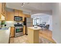 201-1315 12 Avenue Sw, Calgary, AB  - Indoor Photo Showing Kitchen With Stainless Steel Kitchen With Double Sink 