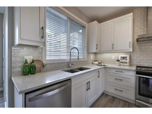 110 Walgrove Cove Se, Calgary, AB - Indoor Photo Showing Kitchen With Stainless Steel Kitchen With Double Sink With Upgraded Kitchen