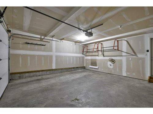 110 Walgrove Cove Se, Calgary, AB - Indoor Photo Showing Garage