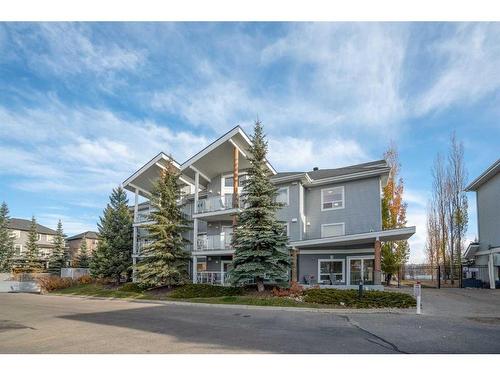 305-390 Marina Drive, Chestermere, AB - Outdoor With Facade