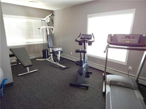 305-390 Marina Drive, Chestermere, AB - Indoor Photo Showing Gym Room