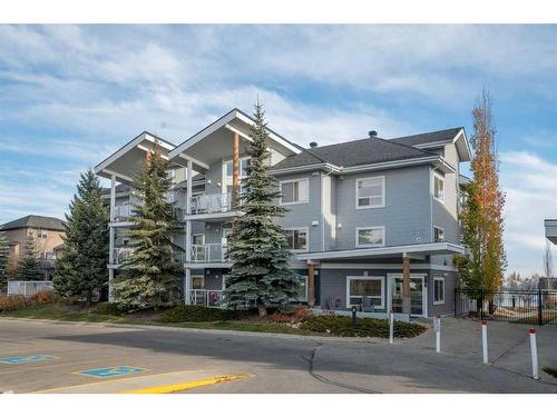 305-390 Marina Drive, Chestermere, AB - Outdoor With Facade