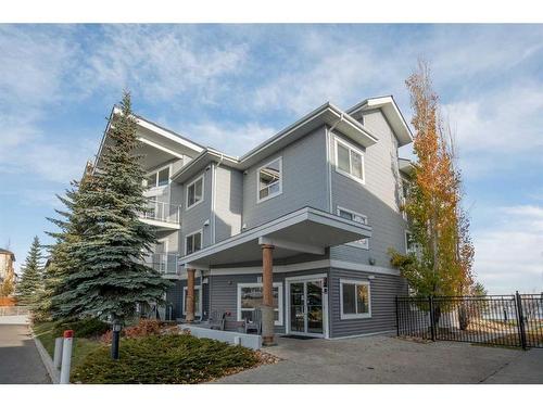 305-390 Marina Drive, Chestermere, AB - Outdoor With Facade