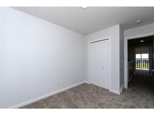 140 Langwell Common Se, Airdrie, AB - Indoor Photo Showing Other Room