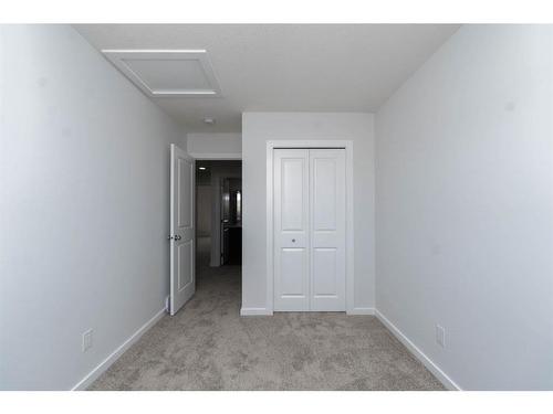 140 Langwell Common Se, Airdrie, AB - Indoor Photo Showing Other Room