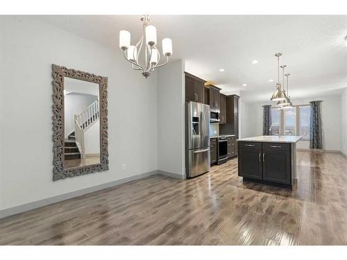 65 River Heights Drive, Cochrane, AB - Indoor Photo Showing Kitchen