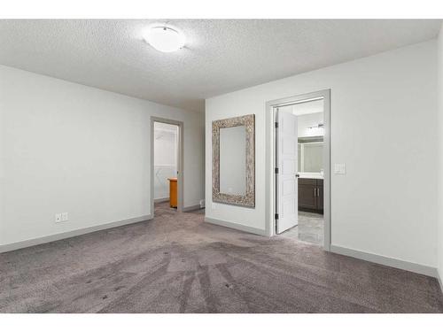 65 River Heights Drive, Cochrane, AB - Indoor Photo Showing Other Room