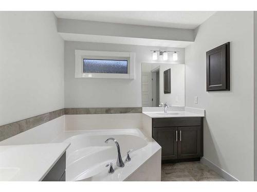 65 River Heights Drive, Cochrane, AB - Indoor Photo Showing Bathroom