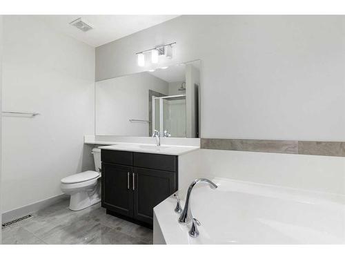 65 River Heights Drive, Cochrane, AB - Indoor Photo Showing Bathroom