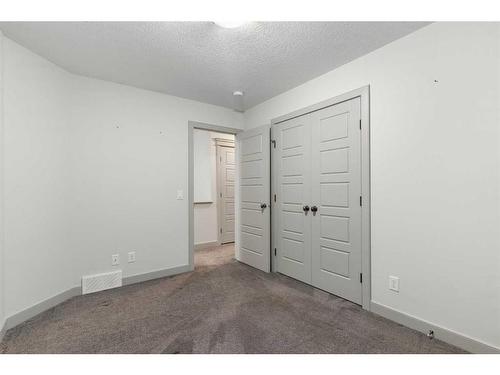 65 River Heights Drive, Cochrane, AB - Indoor Photo Showing Other Room