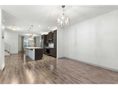 65 River Heights Drive, Cochrane, AB - Indoor Photo Showing Kitchen