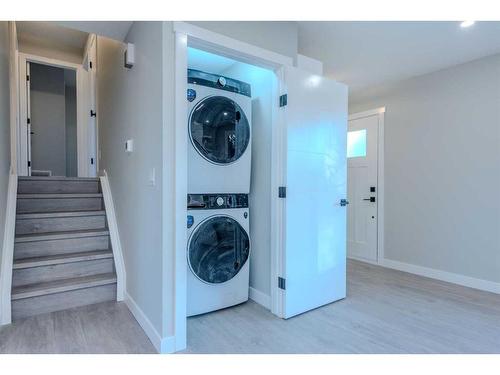 7447 Huntertown Crescent Nw, Calgary, AB - Indoor Photo Showing Laundry Room