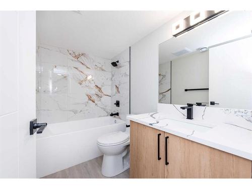 7447 Huntertown Crescent Nw, Calgary, AB - Indoor Photo Showing Bathroom