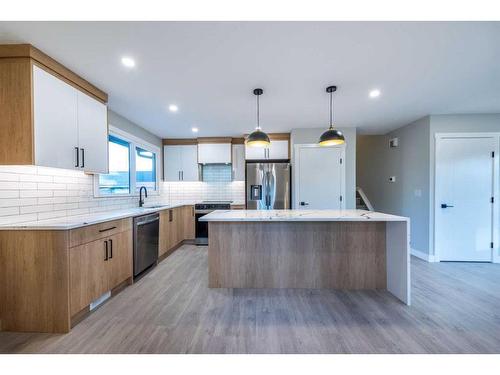 7447 Huntertown Crescent Nw, Calgary, AB - Indoor Photo Showing Kitchen With Upgraded Kitchen