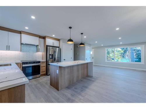 7447 Huntertown Crescent Nw, Calgary, AB - Indoor Photo Showing Kitchen With Upgraded Kitchen