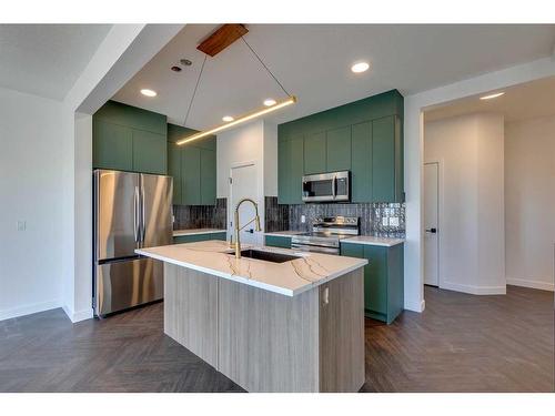 143 Mill Road, Cochrane, AB - Indoor Photo Showing Kitchen With Upgraded Kitchen