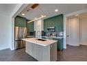 143 Mill Road, Cochrane, AB  - Indoor Photo Showing Kitchen With Upgraded Kitchen 