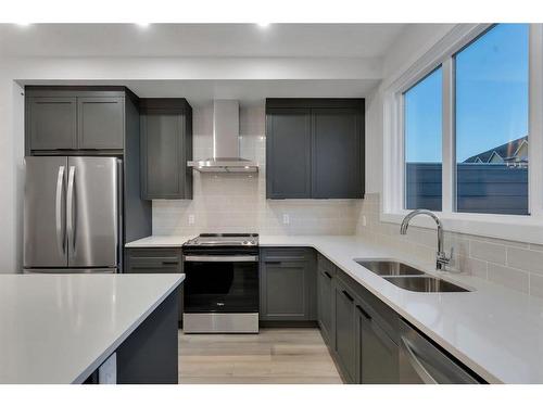 147 South Shore Court, Chestermere, AB - Indoor Photo Showing Kitchen With Stainless Steel Kitchen With Double Sink With Upgraded Kitchen