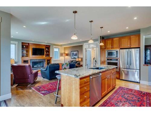 220 18A Street Nw, Calgary, AB - Indoor Photo Showing Kitchen With Fireplace With Upgraded Kitchen