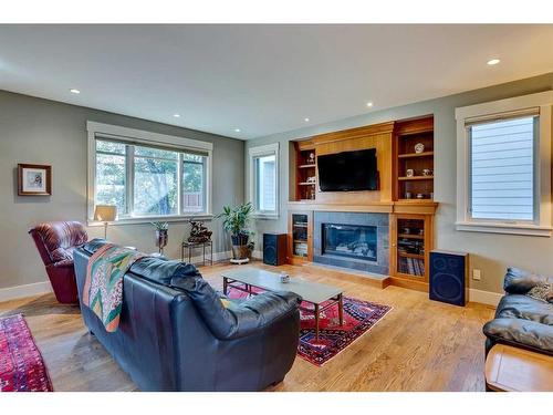 220 18A Street Nw, Calgary, AB - Indoor Photo Showing Living Room With Fireplace