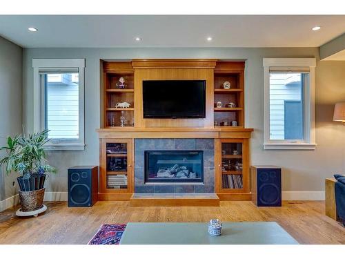 220 18A Street Nw, Calgary, AB - Indoor Photo Showing Living Room With Fireplace