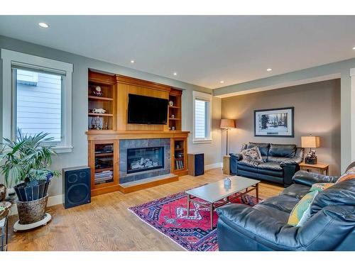 220 18A Street Nw, Calgary, AB - Indoor Photo Showing Living Room With Fireplace