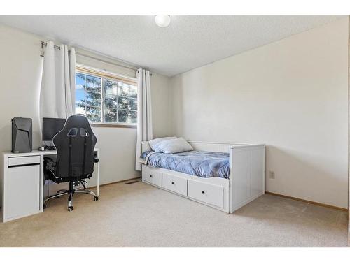 327 Shawbrooke Circle Sw, Calgary, AB - Indoor Photo Showing Bedroom