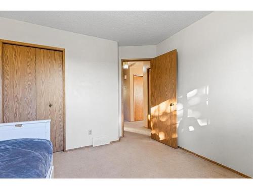 327 Shawbrooke Circle Sw, Calgary, AB - Indoor Photo Showing Bedroom