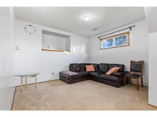 327 Shawbrooke Circle Sw, Calgary, AB - Indoor Photo Showing Living Room