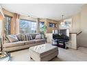 327 Shawbrooke Circle Sw, Calgary, AB  - Indoor Photo Showing Living Room 